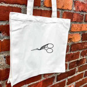 Magnolia and scissors tote bag